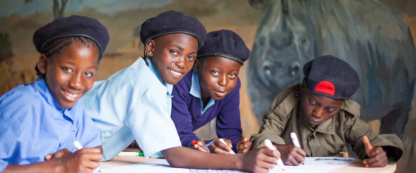 Children in Zambia learn about wildlife and are inspired to love rhino. Credit: Tristan Vince