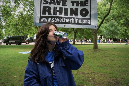 Image of Save the Rhino staff drinking rhino's energy drink.