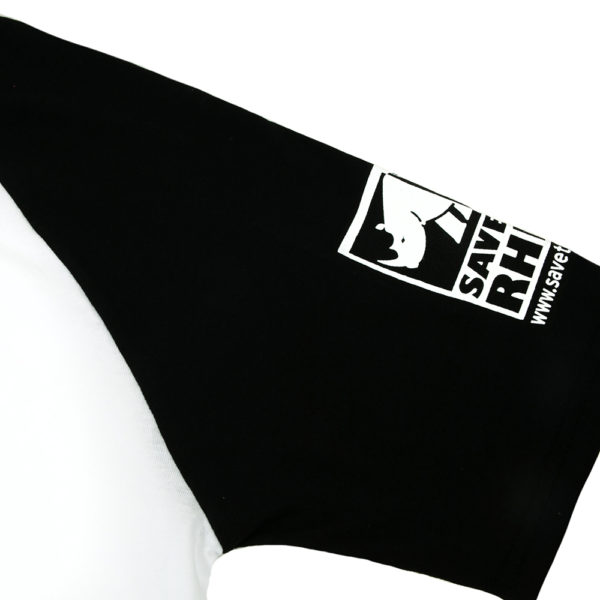 A photograph of the STR logo t-shirt emphasising the logo on the sleeve.