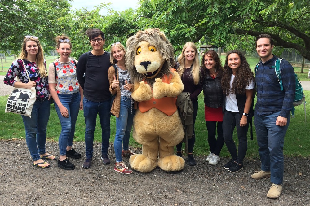 Picture of Save the Rhino team with Reggie the lion at AfricaAlive.