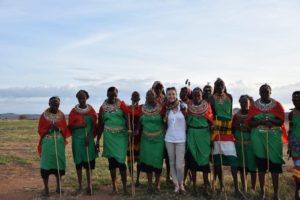 Image of women in the community with Michaela, Save the Rhino's Partnerships Manager.