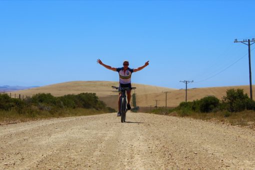 Image of Hugh Carthew on his cycle en route from Durban to Capetown