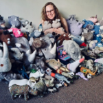 Kylene with her rhino toy collection