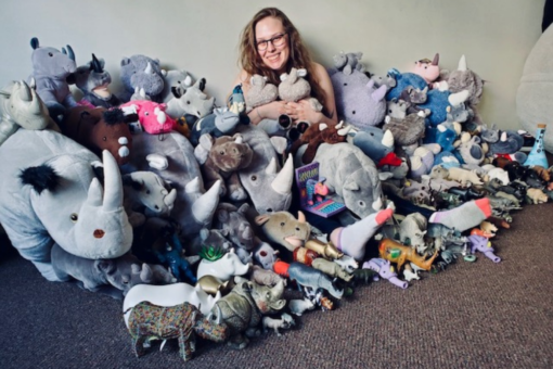 Kylene with her rhino toy collection