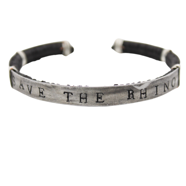 A photograph showing the 'Save the Rhino' stamped bracelet from the front