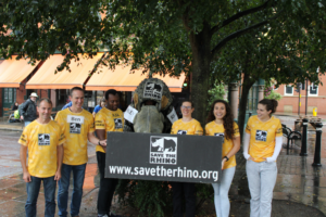 Group of supporters holding Save the Rhino sign