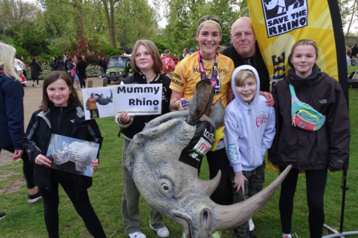A woman and her family after the London Marathon.