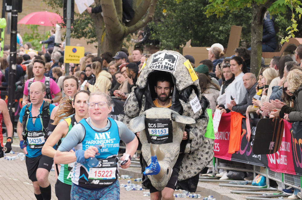 A man in rhino costume during the marathon.