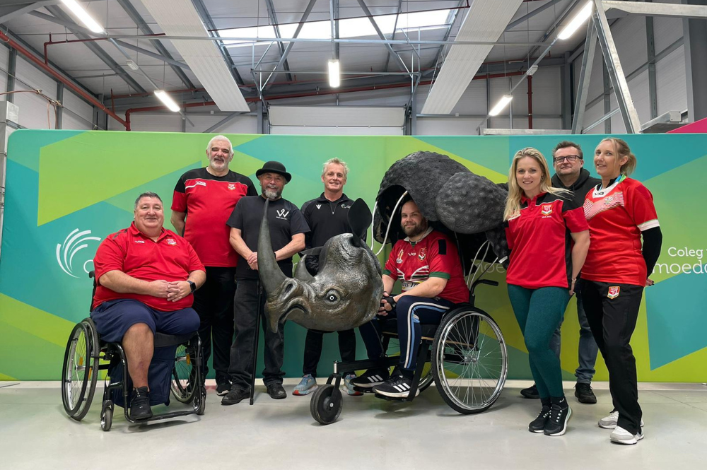 People alongside the Rhino Wheelchair, with Martin in the chair itself.