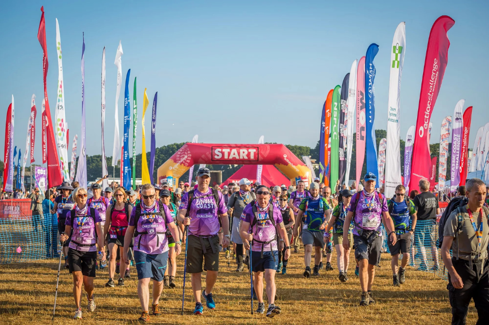 Walkers at the start of the Jurassic Coast Ultra Challenge