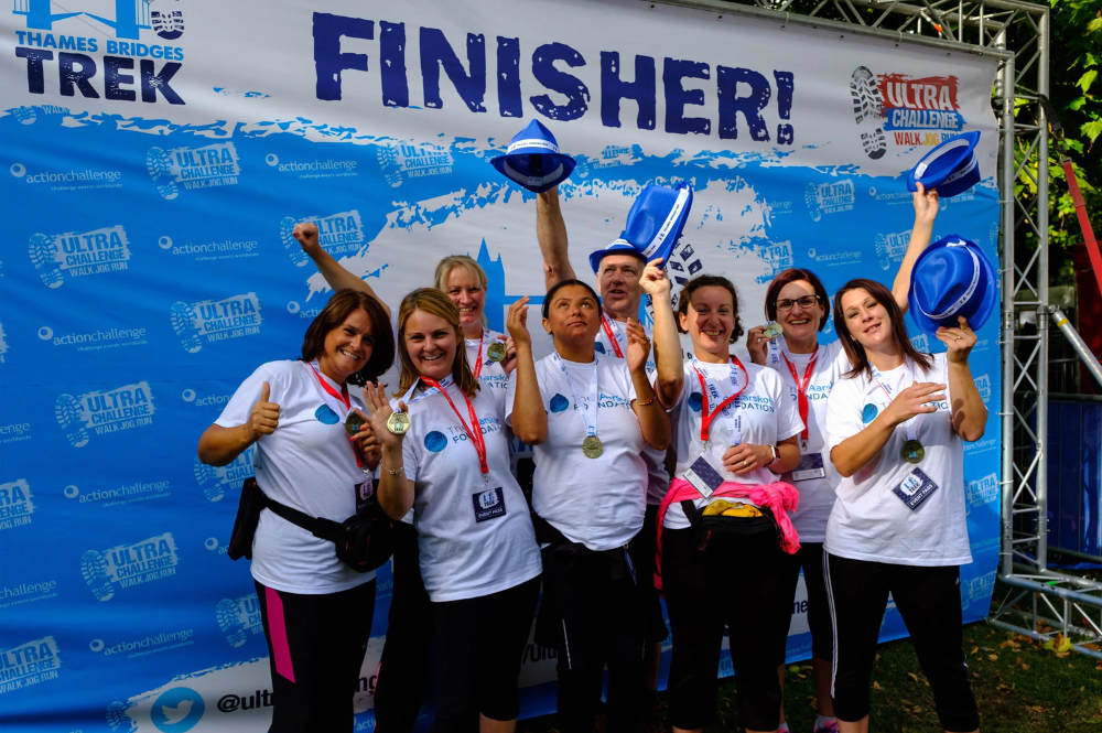 Walkers at the finish line of the Thames Bridge Trek Challenge