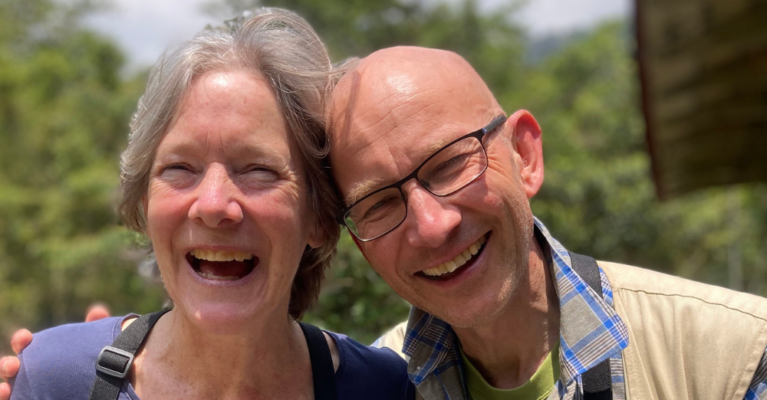 Cathy and Kenneth smiling into the camera