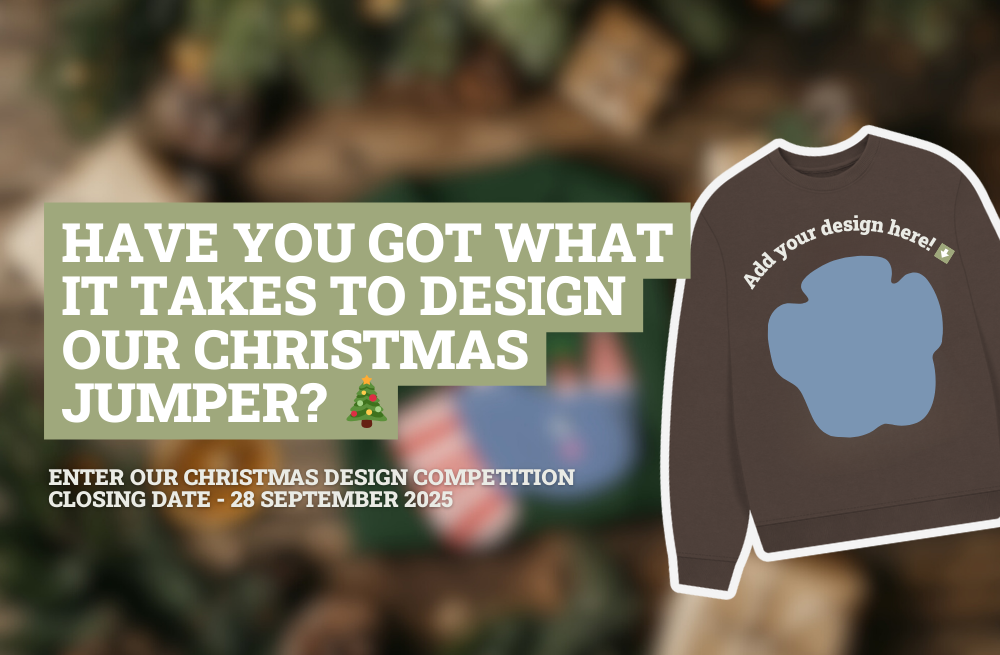 Blurred Christmas image with text that reads: have you got what it takes to design our christmas jumper? 🎄